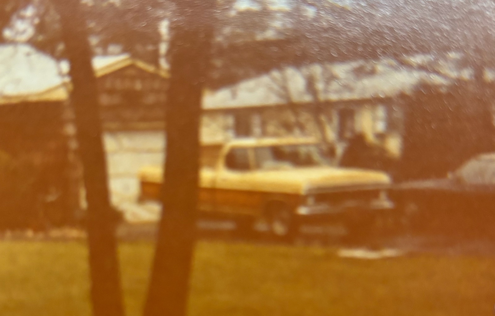 Yellow Ford pickup truck from the 1970s